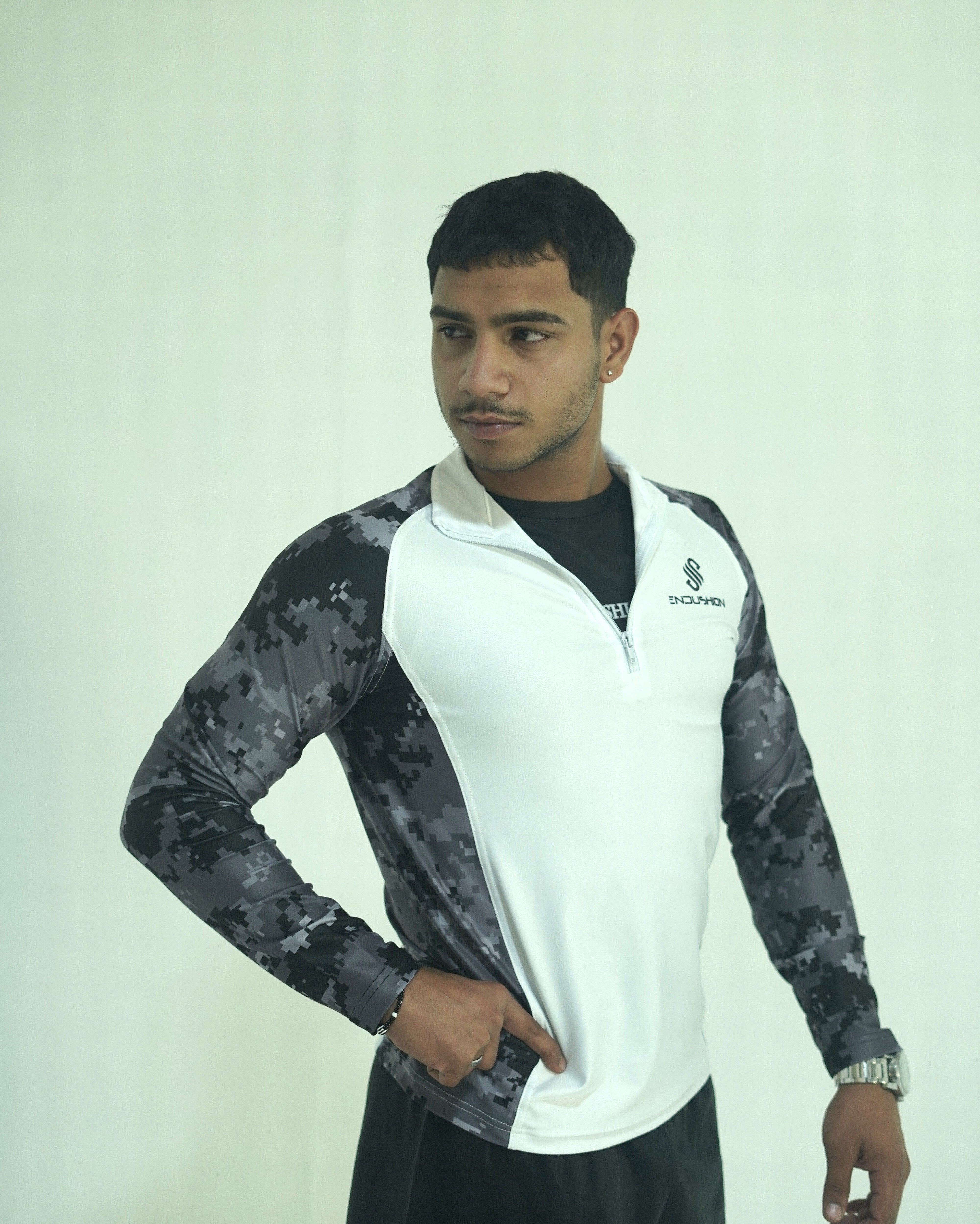 Pulse Flex 1/4 zip                                                                                                                                                                    Black & Grey camouflage