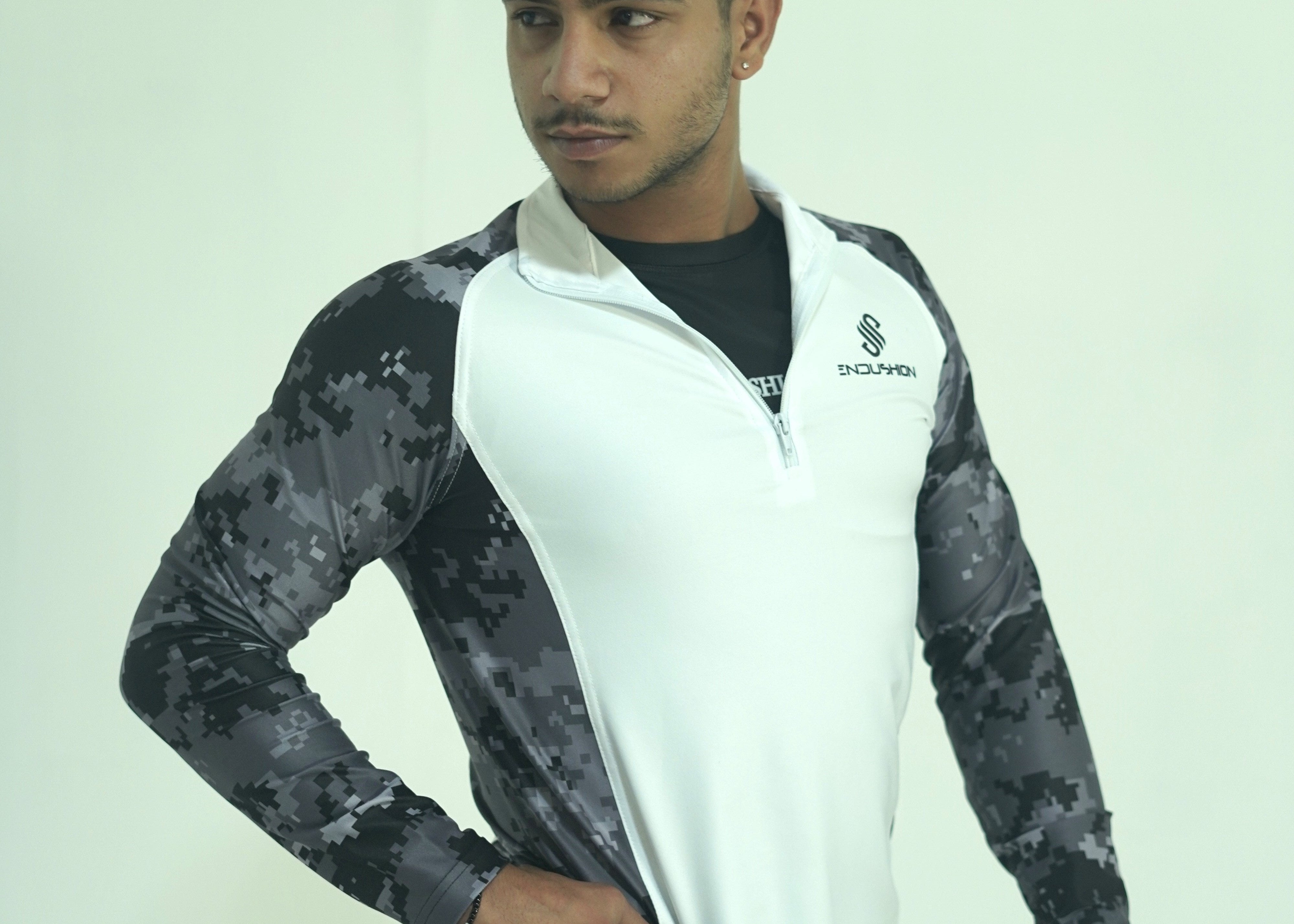 Pulse Flex 1/4 zip                                                                                                                                                                    Black & Grey camouflage