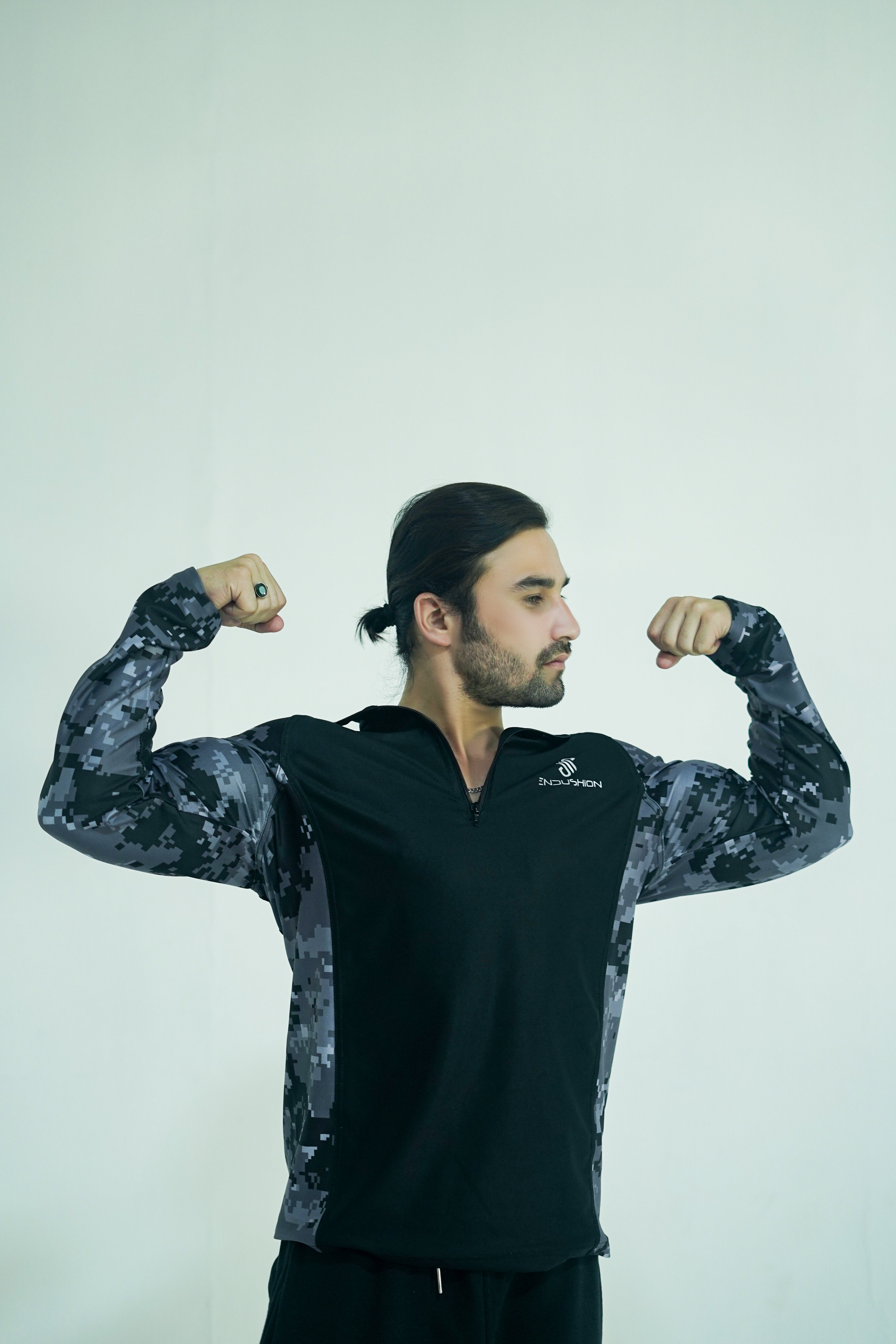 Pulse Flex 1/4 zip                                                                                                                                                                    Black & Grey camouflage