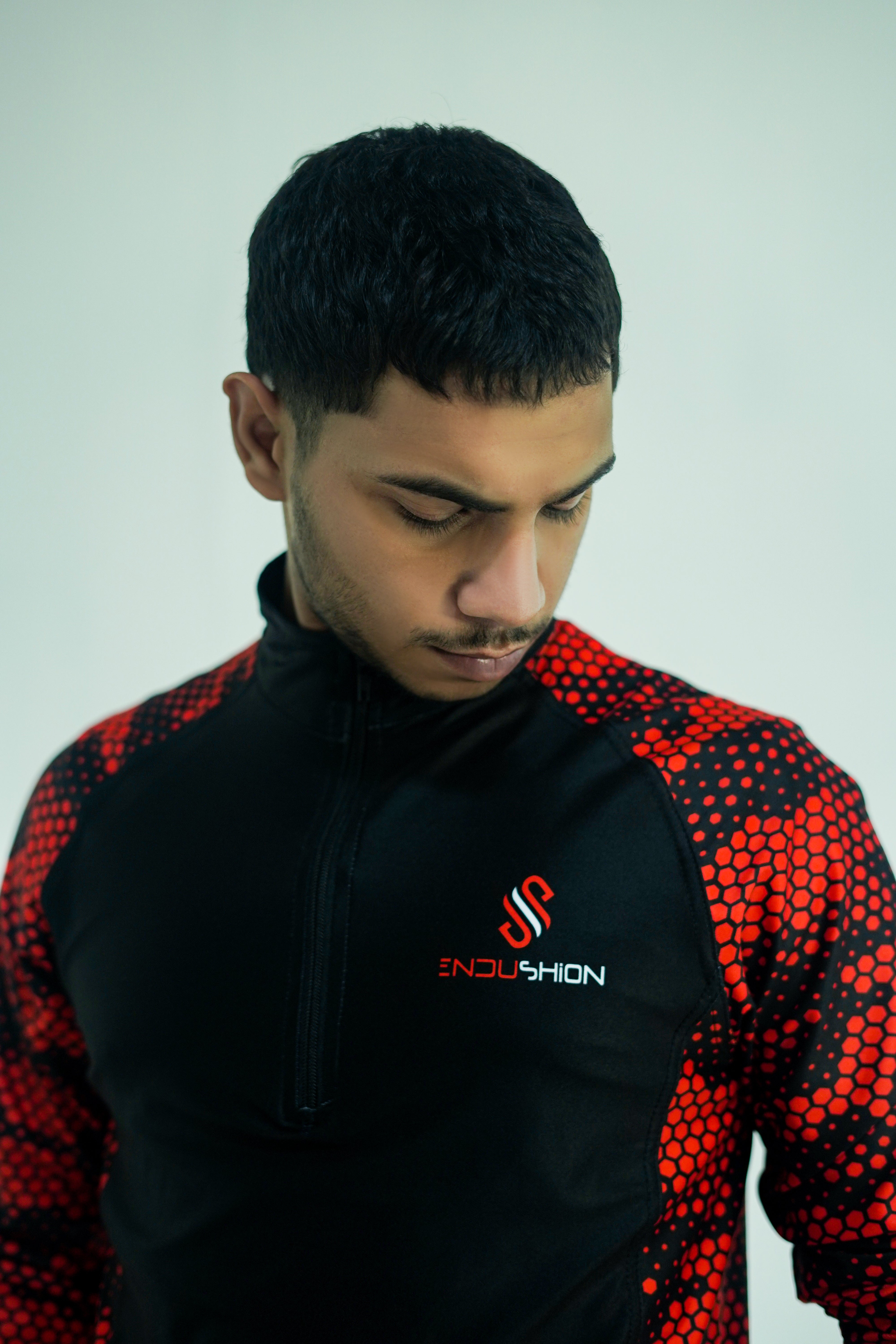 Pulse Flex 1/4 zip                                                                                                                                                                    Black & Red camouflage